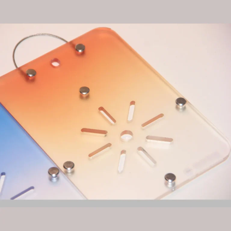 Orange acrylic plant mounting board for staghorn ferns and epiphytic orchids on a light background